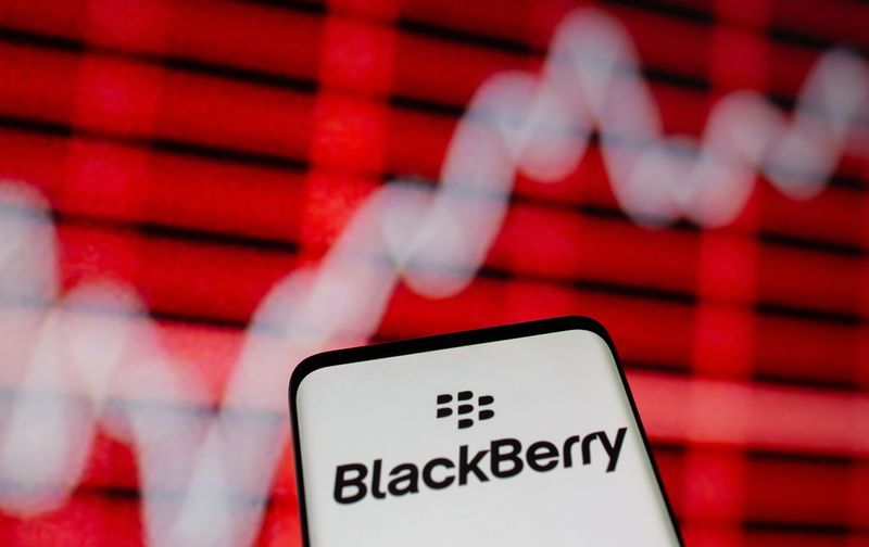 The Blackberry logo is seen on a smarphone in front of a displayed stock graph in this illustration taken February 5 2021. REUTERSDado RuvicIllustrationfile photo