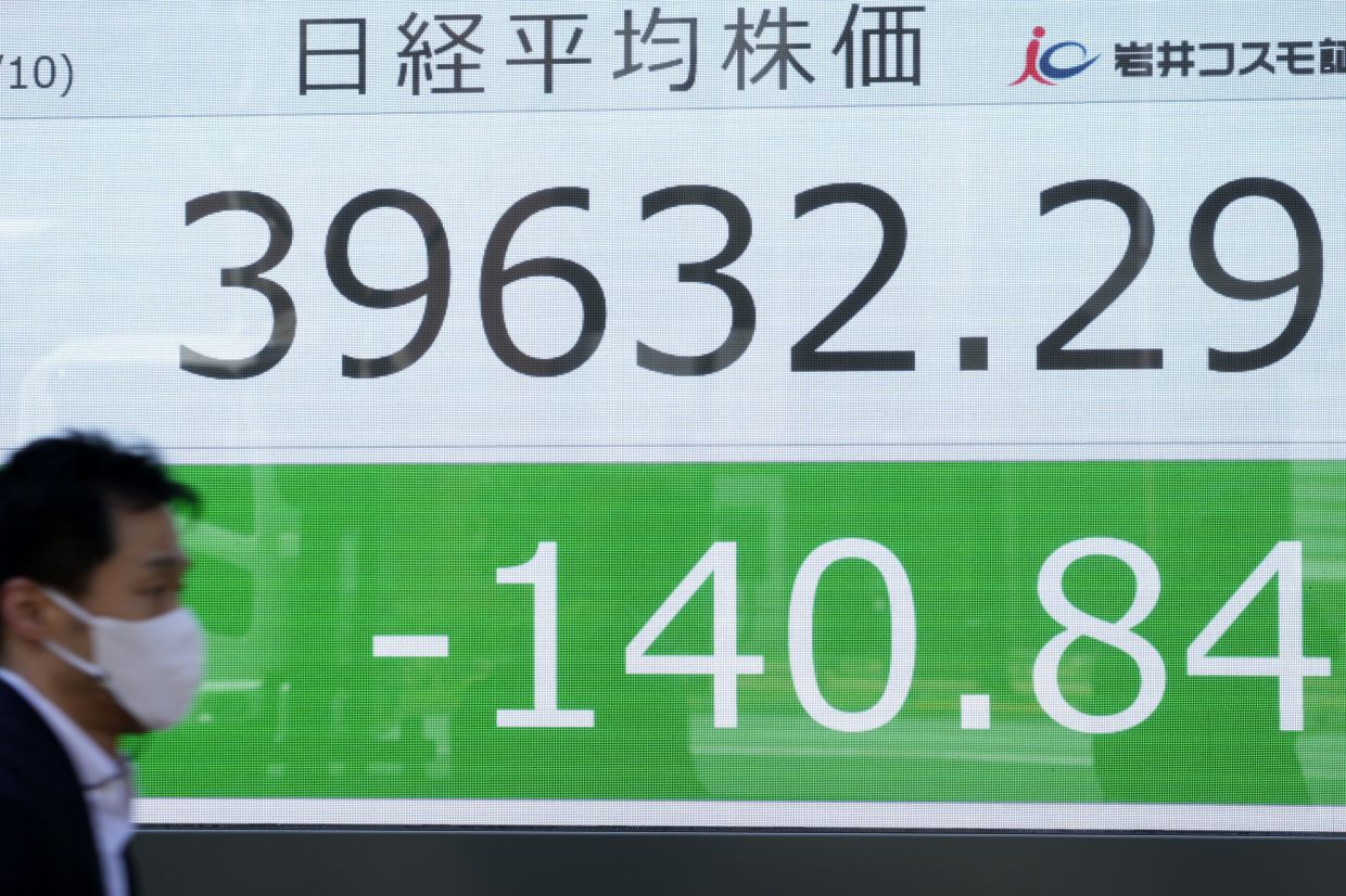 Most Asian markets rise as traders jockey ahead of US inflation | The Star