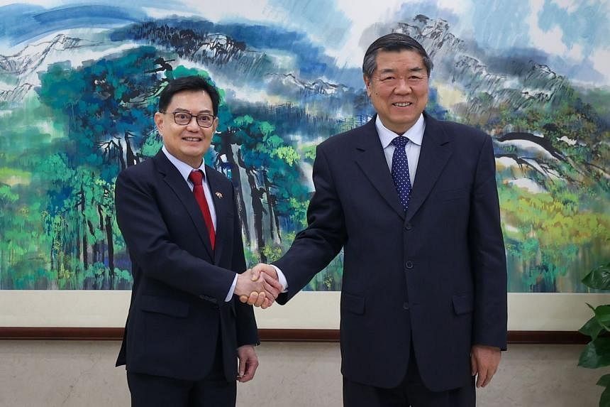 Singapore and China can boost cooperation to ensure financial stability: DPM Heng - Vimarsana News