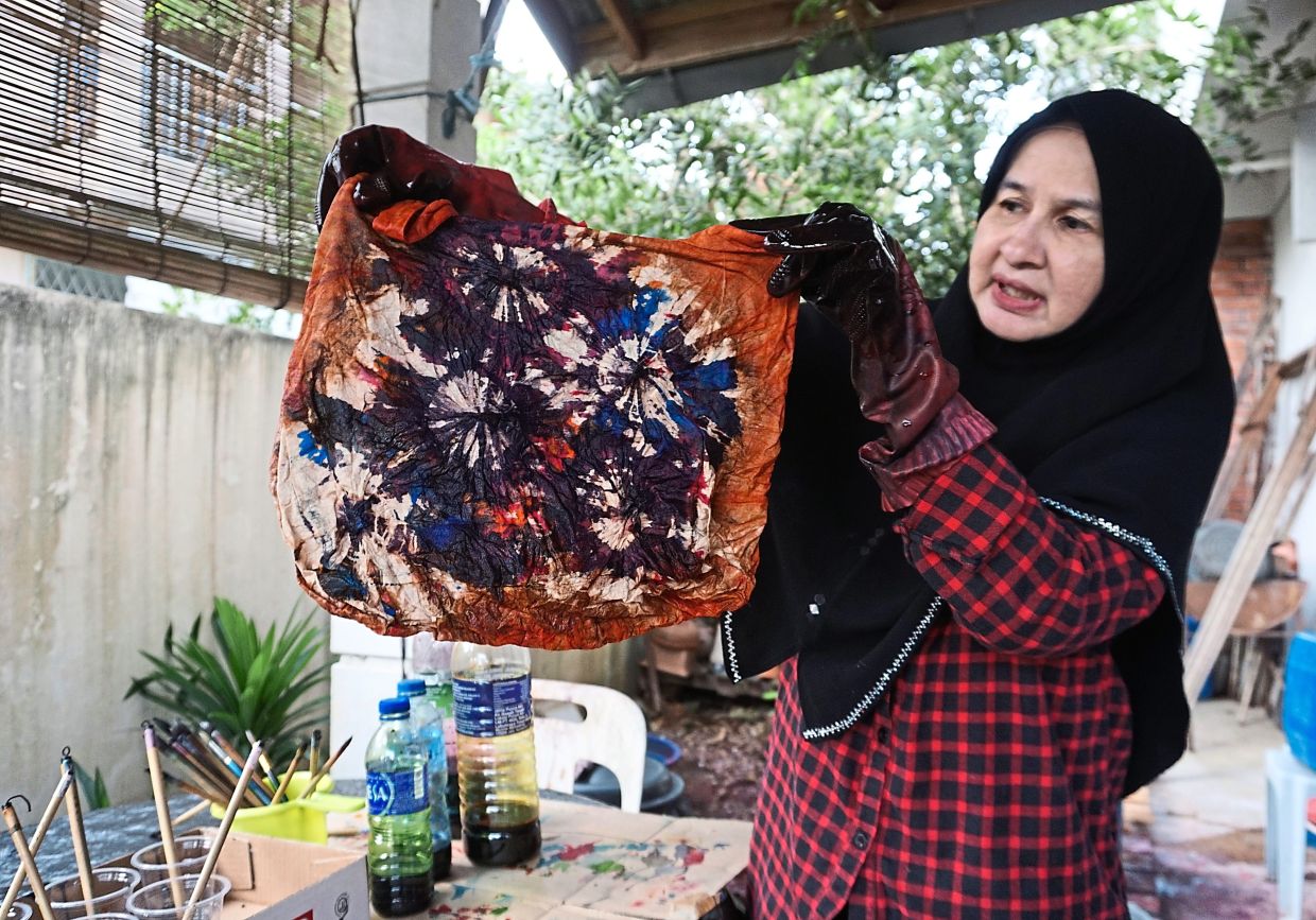 Noor Atikah prefers using three techniques of sewing, tying and folding to produce her tie-dye creations.