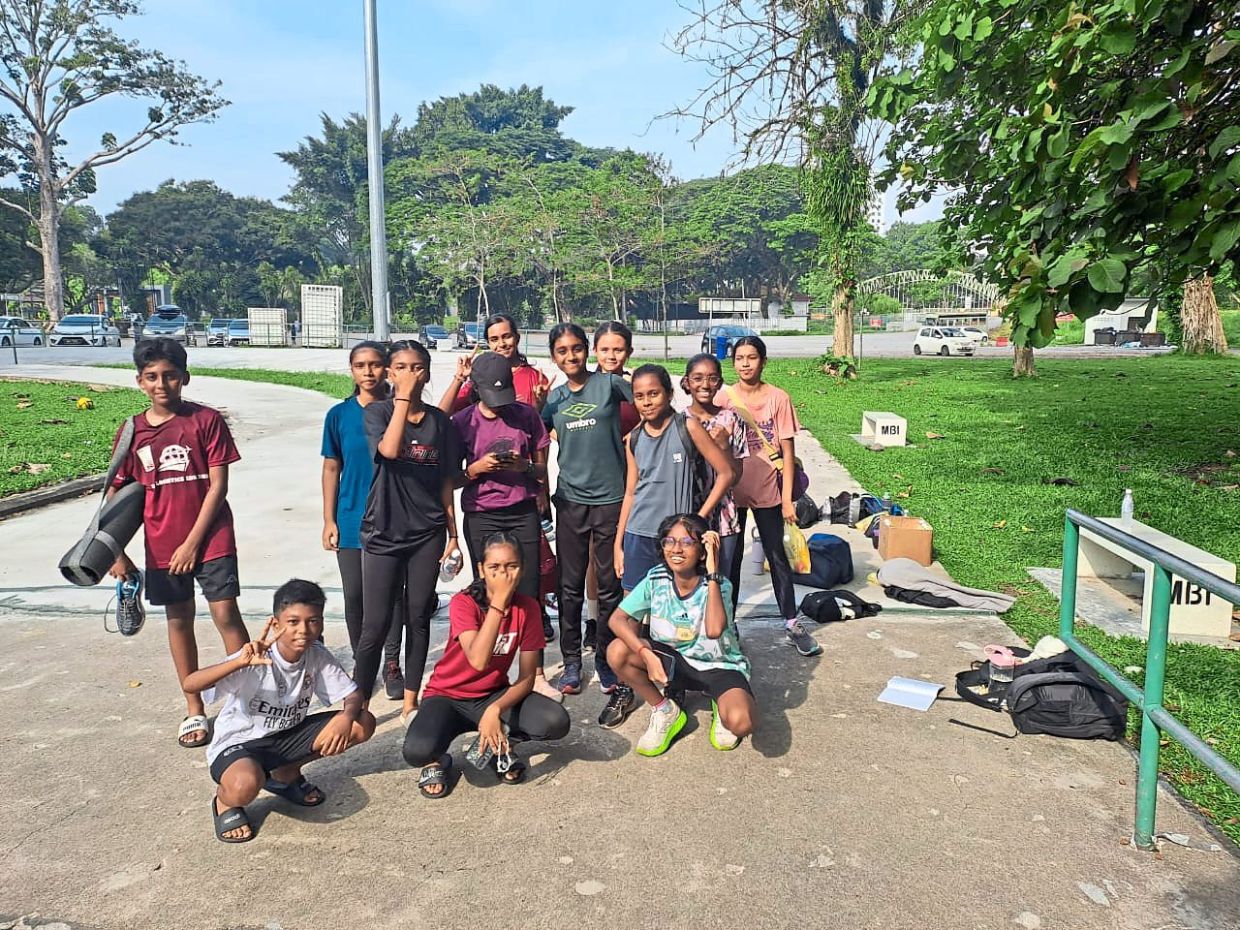 Time well spent: Josephine’s Panther Athletics Club trainees posing for a photograph after a training session.