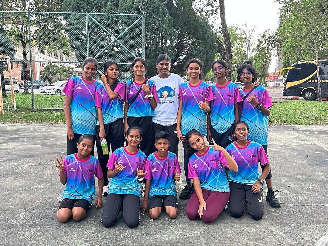 One for the album: Josephine (back row, fourth from left) with her trainees.