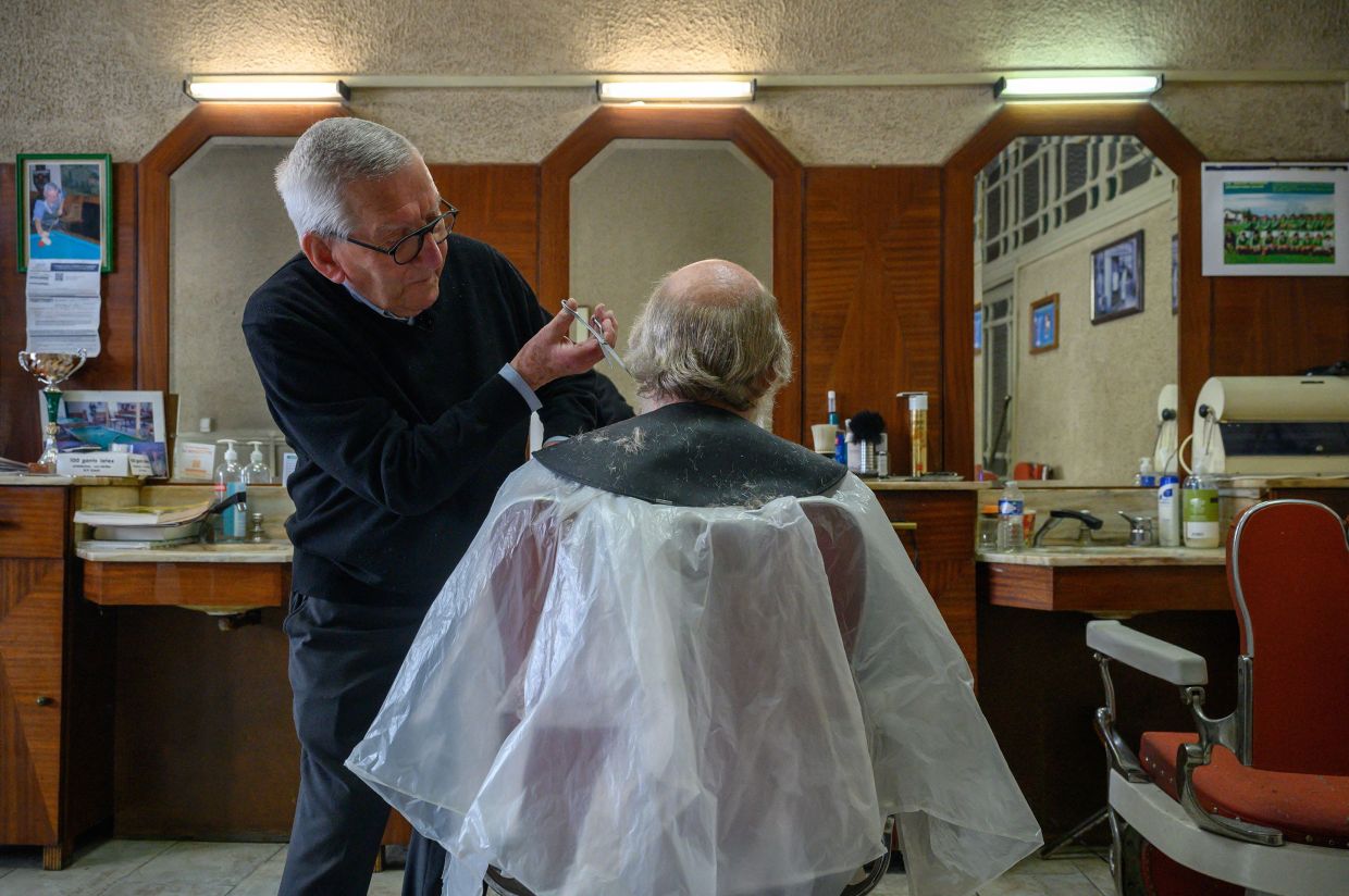 Outliving greased back quiffs and bowl cuts: French barber still trimming at 90 - Vimarsana News