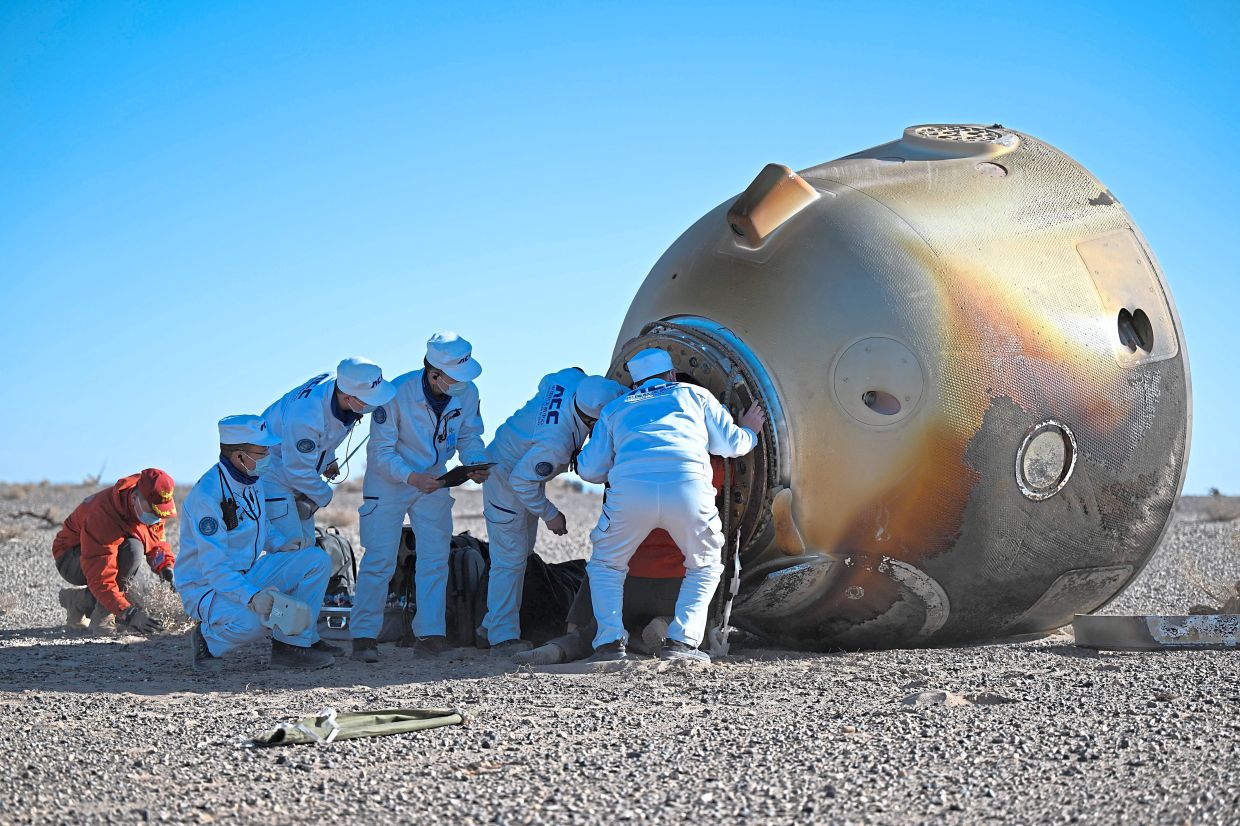 Chinese astronauts return to Earth after six months on space station ...