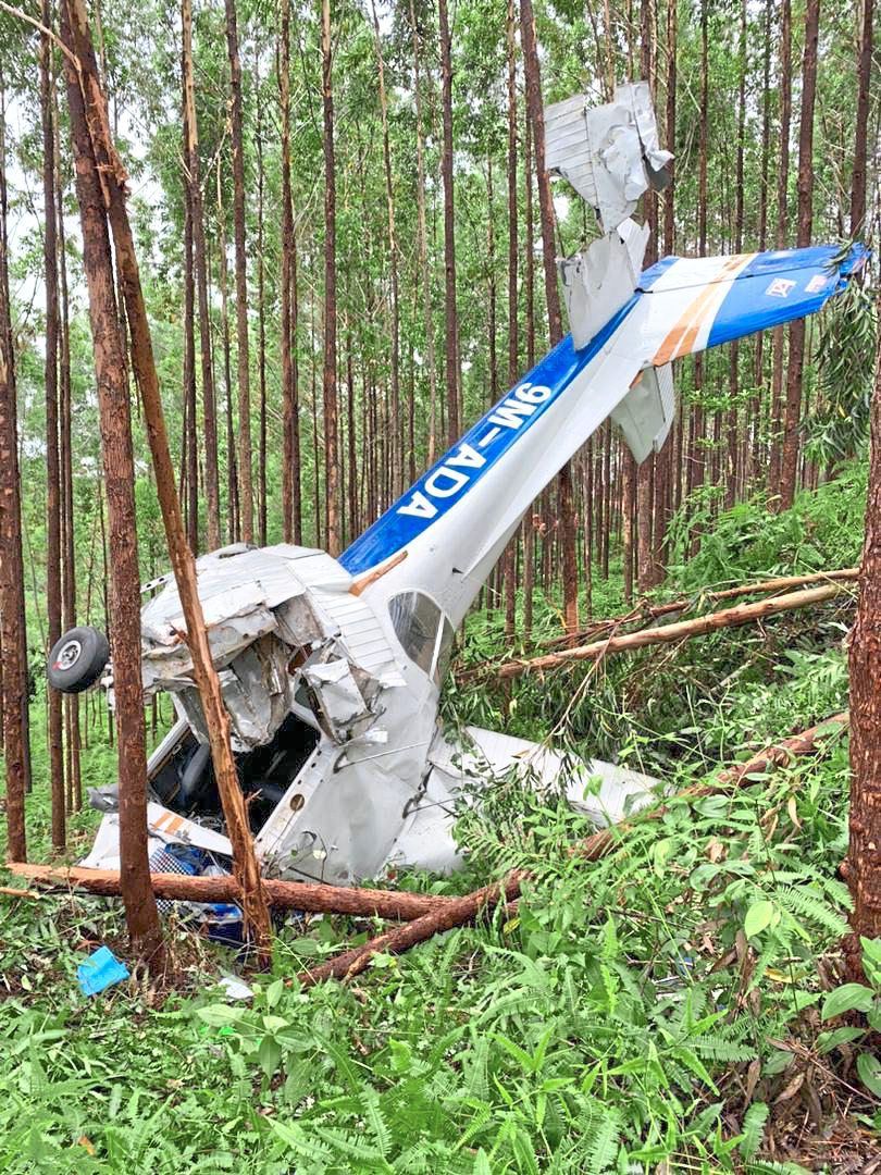 Crash site: The Cessna light aircraft crashed near Felda Besout in Muallim. — Photo sourced from social media