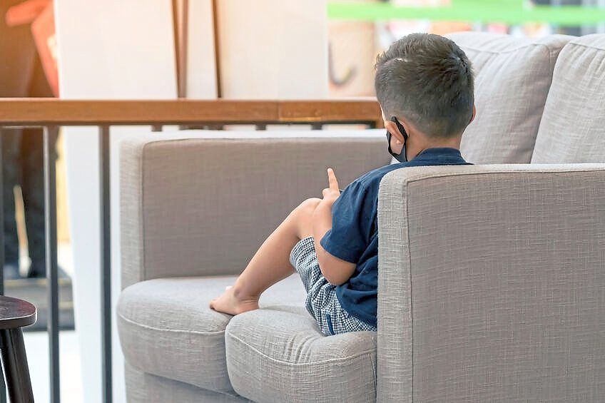 Excessive screentime can be one way a child copes unhealthily with problems or stressors, as it allows them to ignore and avoid them. — 123rf.com