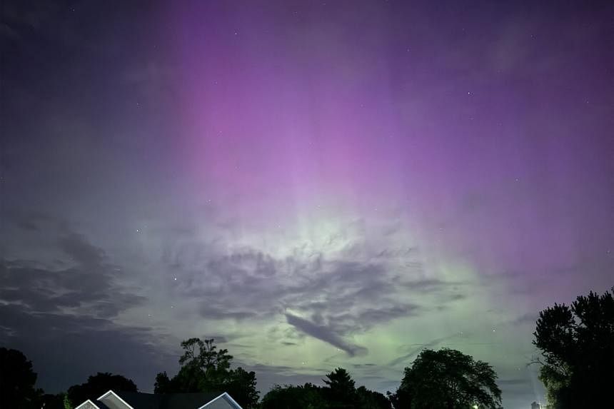 An aurora borealis seen over Ohio, during a geomagnetic storm on May 10. - PHOTO: AFP