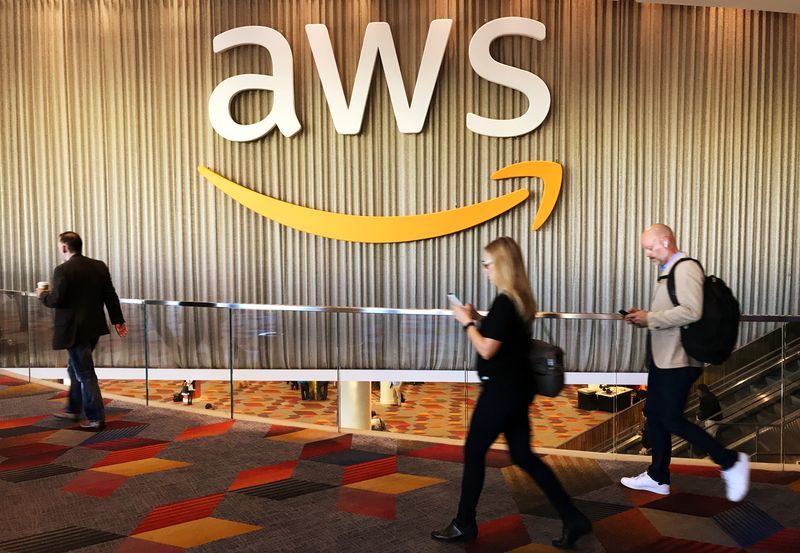 Attendees at Amazon.com Inc annual cloud computing conference walk past the Amazon Web Services logo in Las Vegas Nevada U.S. November 30 2017.    REUTERSSalvador RodriguezFile Photo