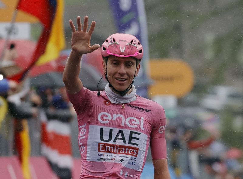 Cycling-Pogacar powers to win number five in weather-hit Giro stage