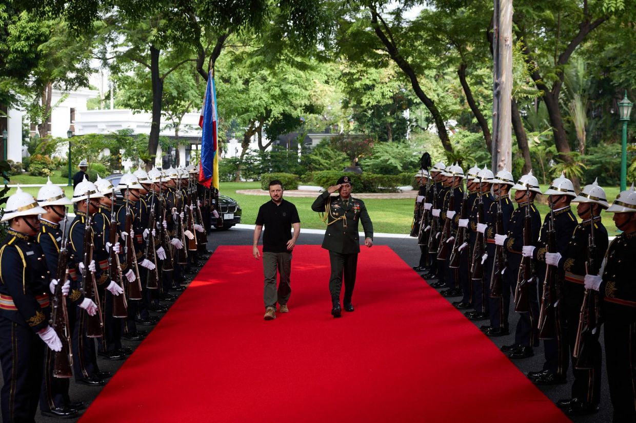 Ukraine's President Volodymyr Zelensky (left) arrives for a meeting with Philippines' President at the Malacanang Palace in Manila on Monday, June 3, 2024. - AFP