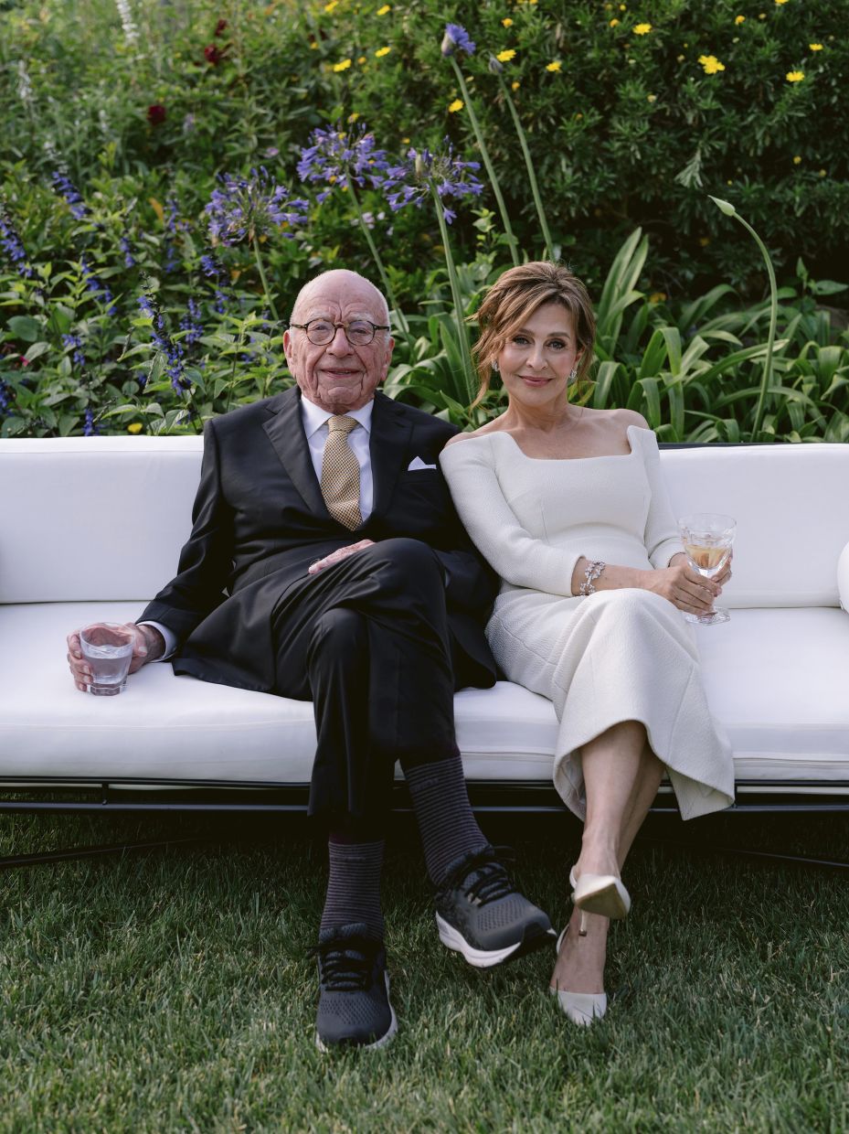 The billionaire was seen wearing sneakers with his suit during the wedding, instead of leather shoes. Photo: AP