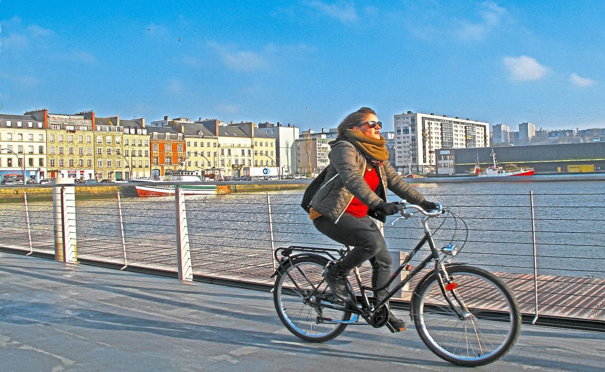 Discover major attractions in Normandy like Cherbourg by bike. — DAVID BOWDEN