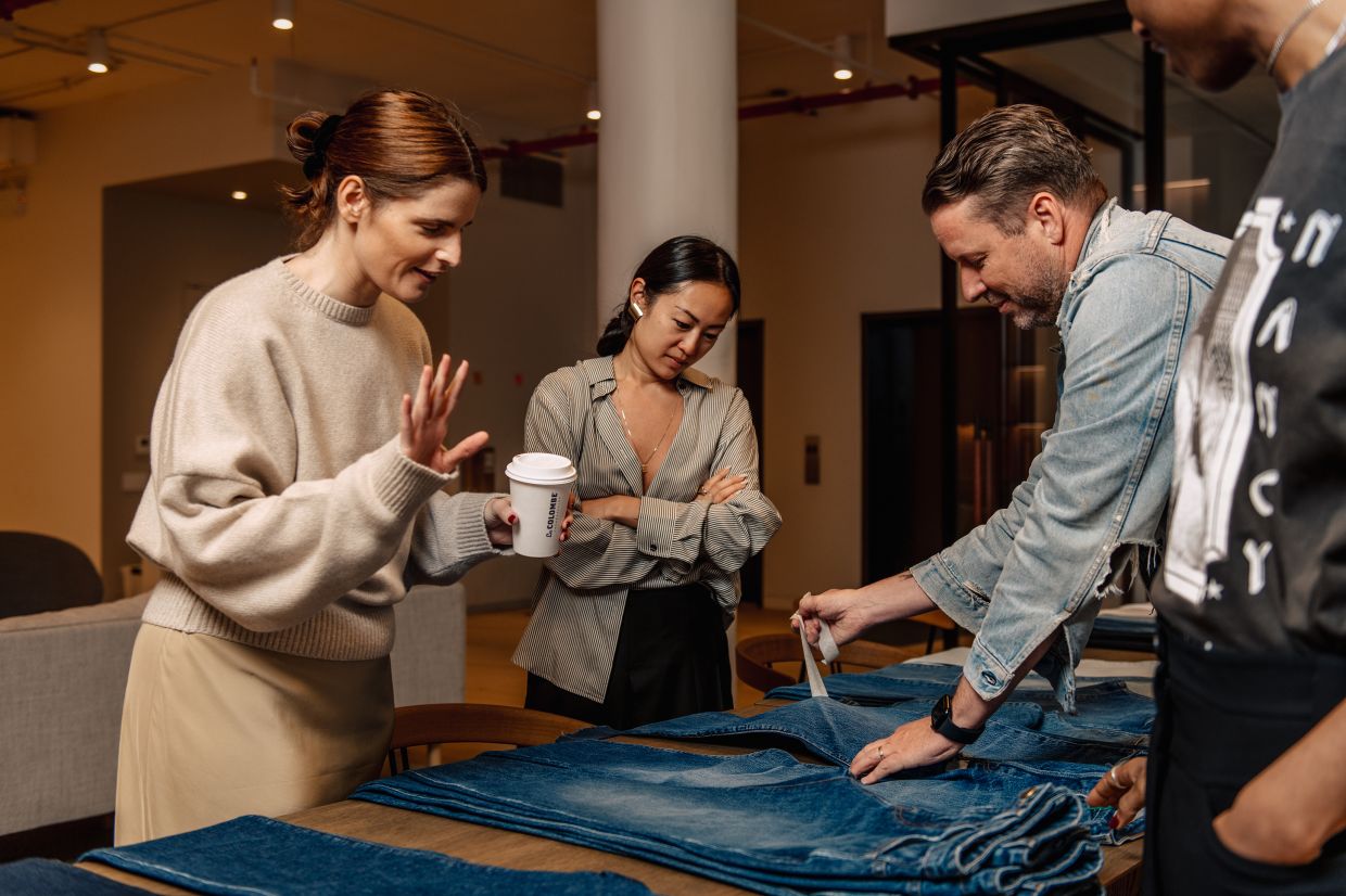 Benjamin Talley Smith reviews jeans with Catherine Holstein (right) in the SoHo offices of Khaite, Holstein’s brand. Photo: The New York Times