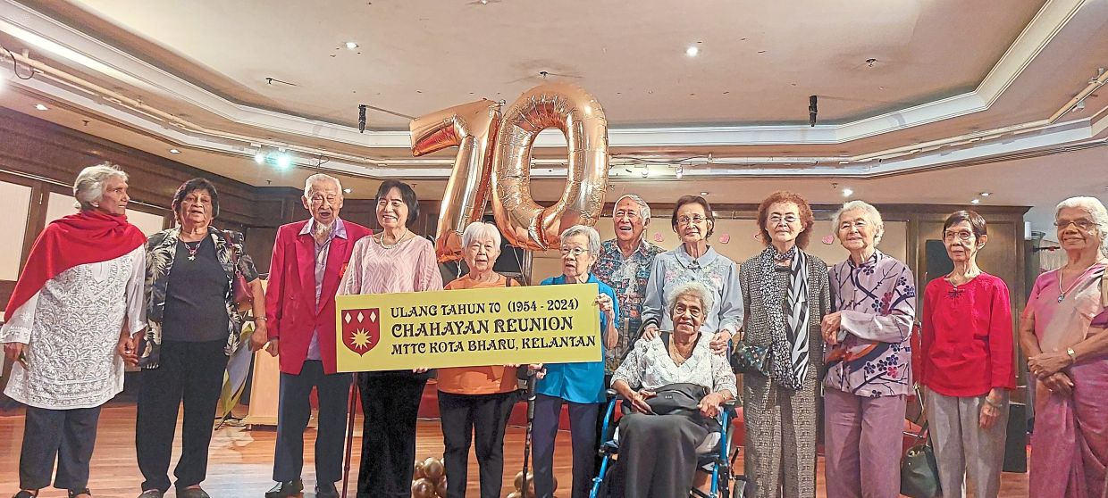MTTC Kota Baru alumni all smiles at the reunion in Kuala Lumpur. — Courtesy photo