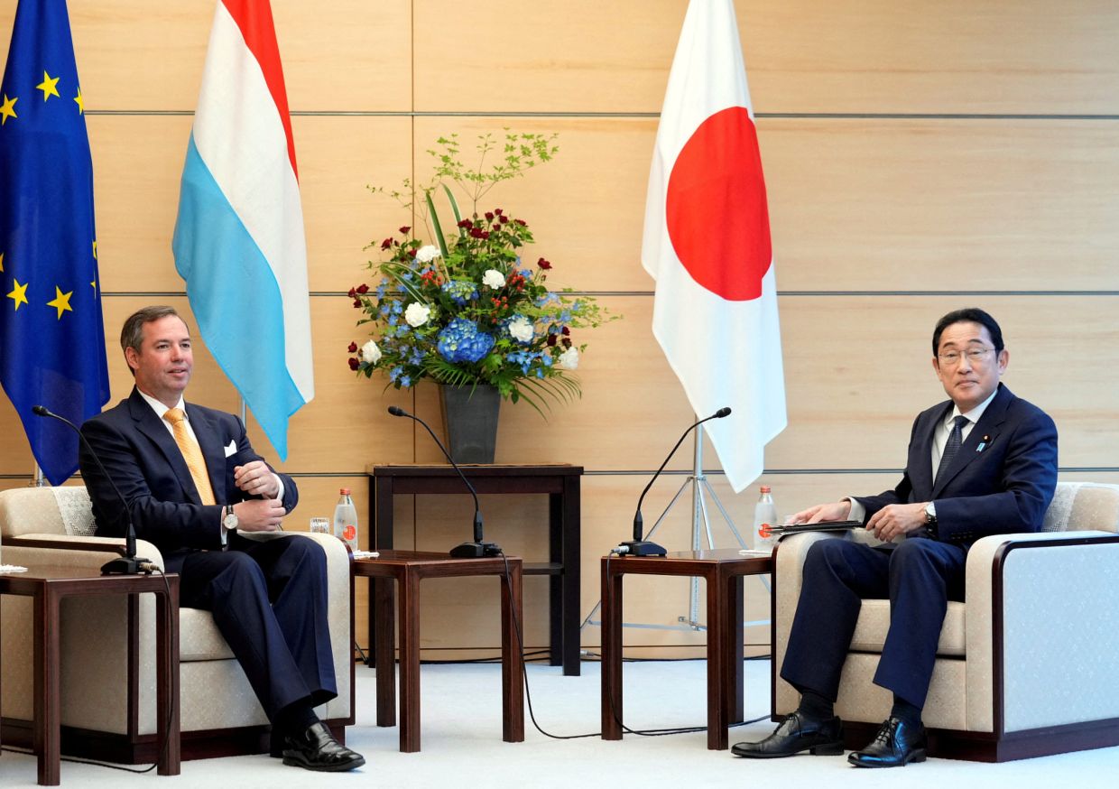 Luxembourg's Crown Prince Guillaume and Japan's Prime Minister Fumio Kishida sit at the start of their meeting at the prime minister's official residence in Tokyo, Japan, on Monday, 10 June 2024. - Reuters