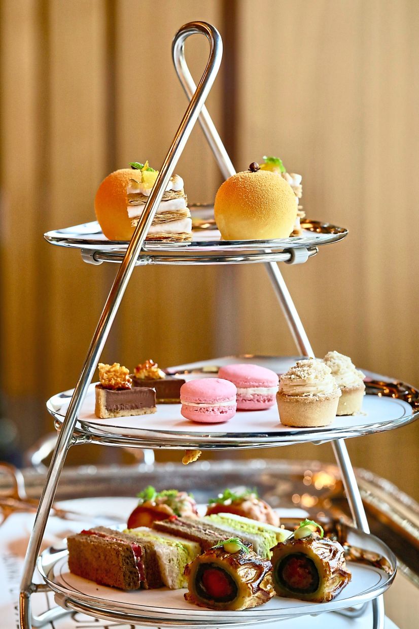 Tea served with signatures like Beef Wellington, Manjari 64% chocolate tart and Yuzu Mille-feuille. — Photos: LOW LAY PHON/The Star