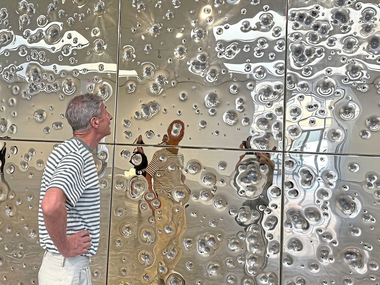 Cattelan, describing an idea that developed over time, says that at one point, he envisioned a gallery divided in two, with shooters on one side of a see-through bulletproof wall, and visitors on the other. Photo: AP