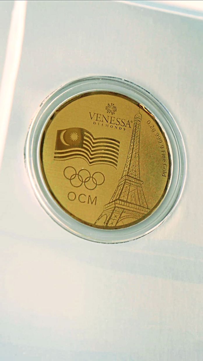 The 999 fine gold coin.