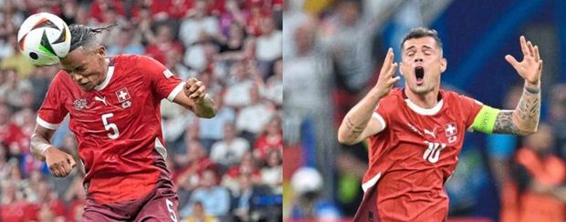 Well done, boys: Switzerland’s Manuel Akanji (left) and Granit Xhaka have earned praises from coach Murat Yakin. — AP