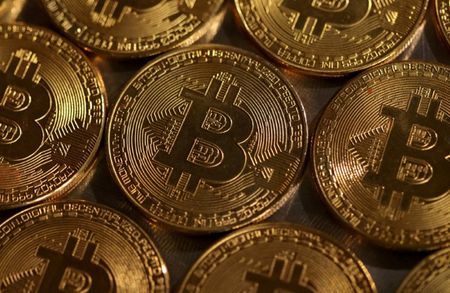FILE PHOTO Representations of cryptocurrency Bitcoin are seen in this illustration August 10 2022. REUTERSDado RuvicIllustrationFile Photo