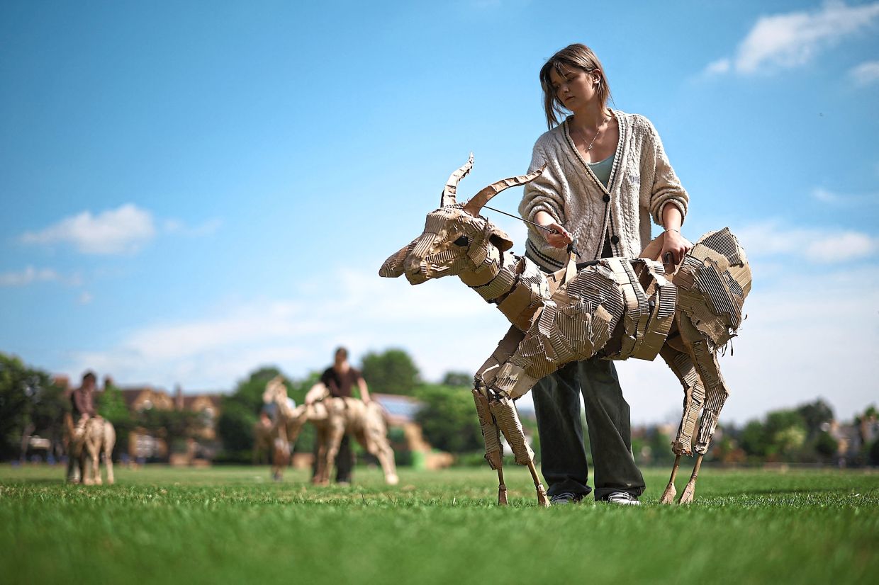 'The Herds' animal puppets on a global trek to raise climate awareness