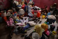 Camping in schools, hungry Haiti families ask: when will normality return?