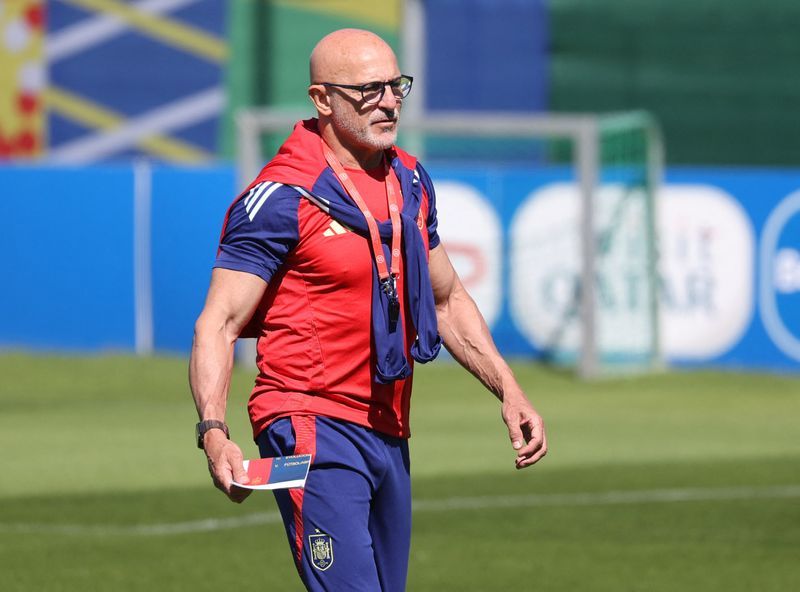 Soccer-Spain's path to victory is through the beautiful game, coach says
