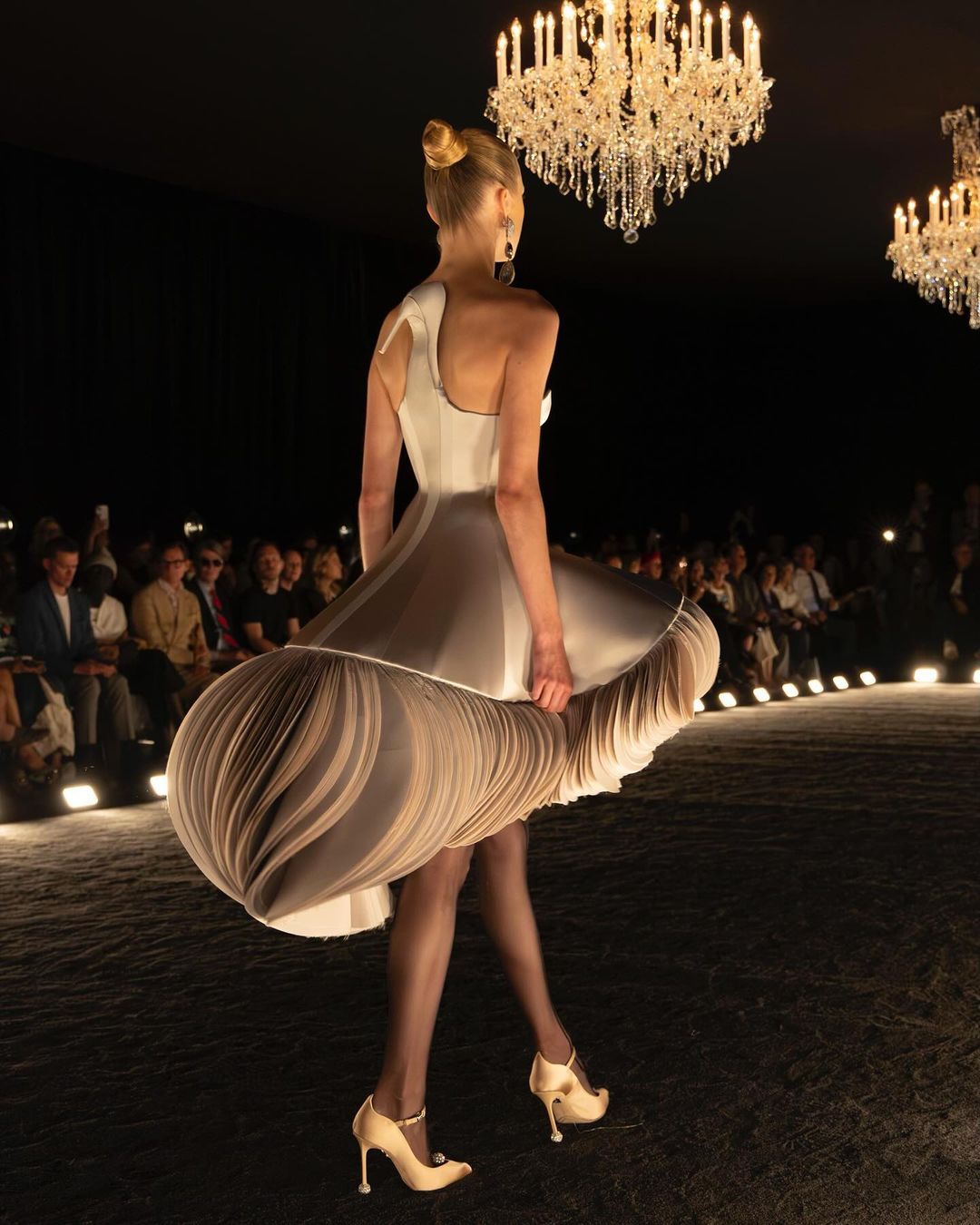 Schiaparelli’s bustier dress of moving circles creates a mesmerising effect. Photo: Instagram/Schiaparelli
