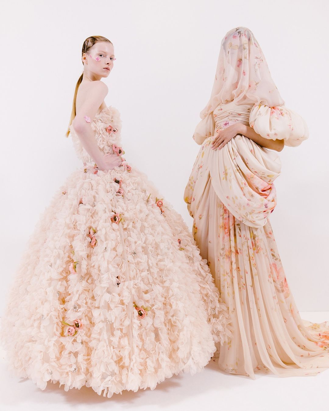 Giambattista Valli's collection is true to his signature of illusions with these beautiful gowns of froth and flowers. Photo: Instagram/Giambattista Valli