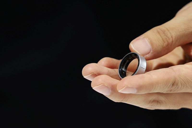 An attendee films Samsung Electronics Galaxy Smart Ring during its unveiling ceremony in Seoul South Korea July 8 2024. REUTERSKim Hong-Ji