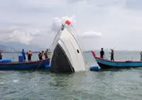 Two men rescued after boat capsizes near Pulau Jerjak