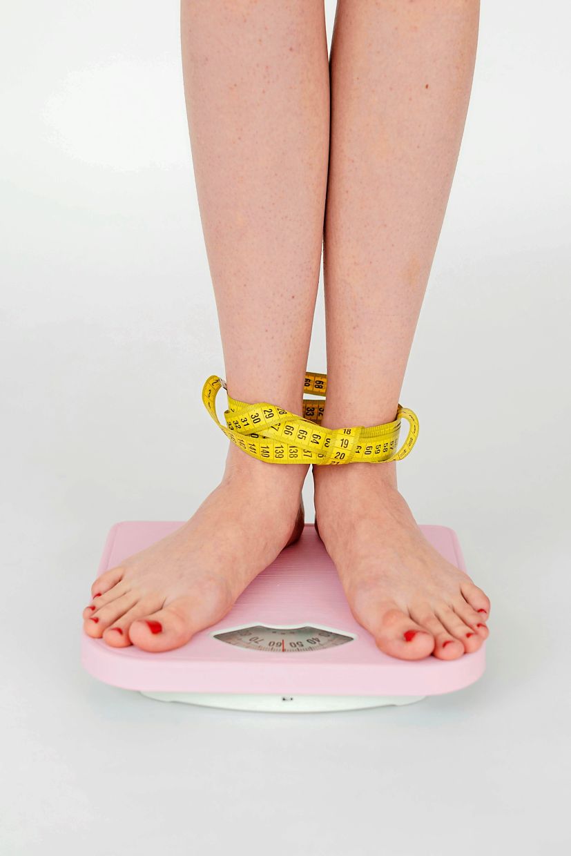 Losing inches does not mean the scales will also show weight loss as you may have lost fat but gained more muscles.