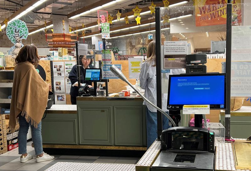 A cash register shows a blue screen at a grocery store affected by a cyber outage in Sydney Australia July 19 2024. REUTERSStella Qiu