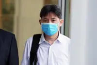 Jail for ex-SMU Academy associate director who accepted S$472,000 in bribes