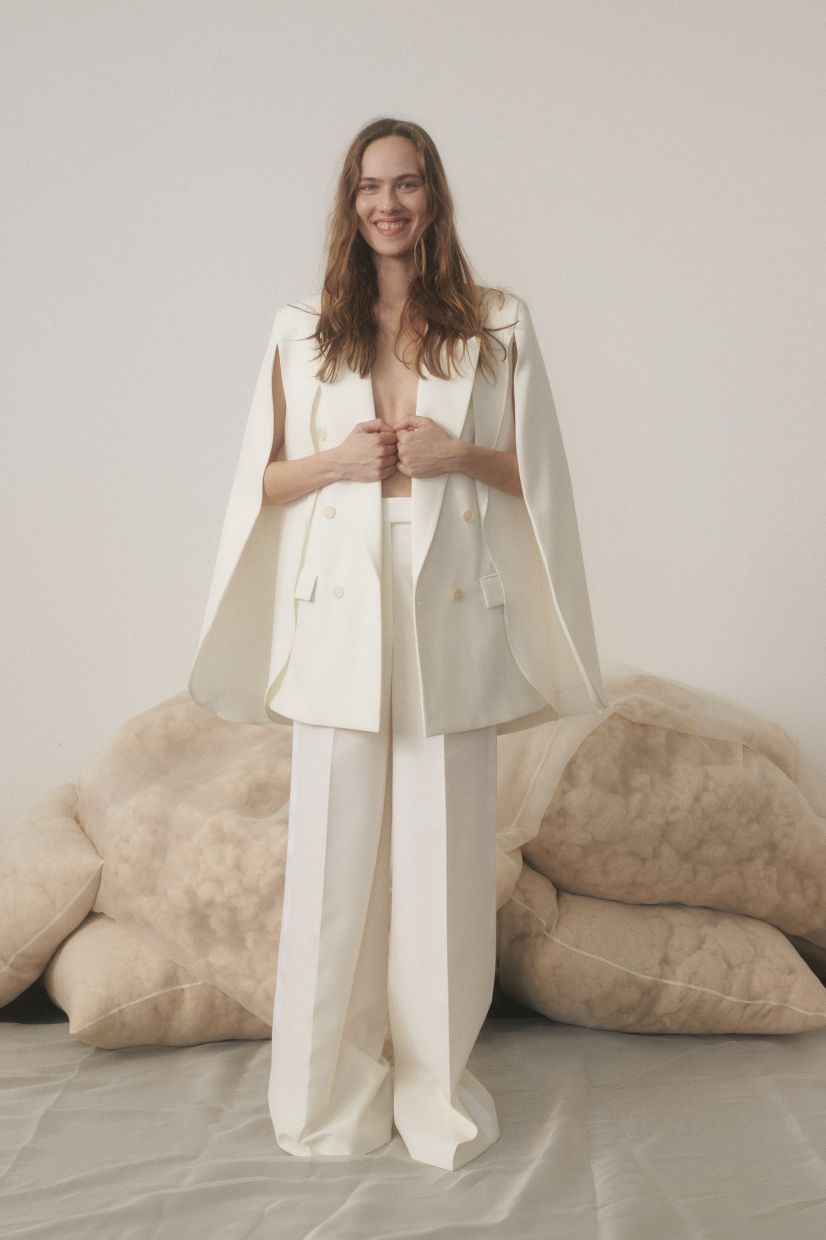 For a chic and effortless look, this double-breasted blazer and trousers featuring relaxed tailoring and cape accent is just perfect. Photo: Stella McCartney