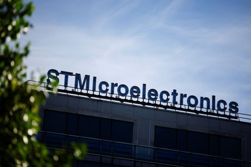FILE PHOTOThe logo of electronics and semiconductors manufacturer STMIcroelectronics is seen outside a company building in Montrouge near Paris France July 12 2022. REUTERSSarah Meyssonnier