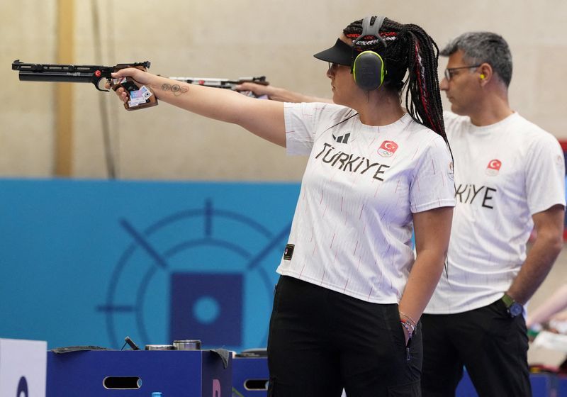 Shooting: Olympics-Shooting-Casual Turkish shooter goes viral, teammate ...