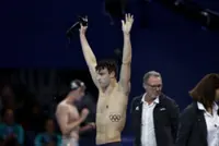Olympics-Swimming-Finke breaks world record to win men's 1,500m freestyle gold