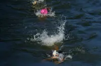 Olympics-Marathon swimming-Familiarisation day cancelled, organisers say
