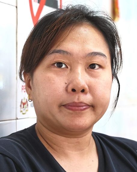 Hew says customers still smoke in the shop despite reminders on each table.