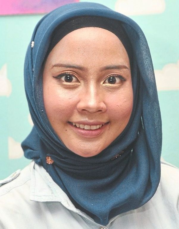 Aisha is disappointed to see people still openly smoking at eateries.