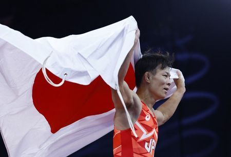 Paris 2024 Olympics - Wrestling - Mens Freestyle 57kg Final - Champ-de-Mars Arena Paris France - August 09 2024. Rei Higuchi of Japan celebrates winning gold in the match against Spencer Richard Lee of United States. REUTERSKim Kyung-Hoon
