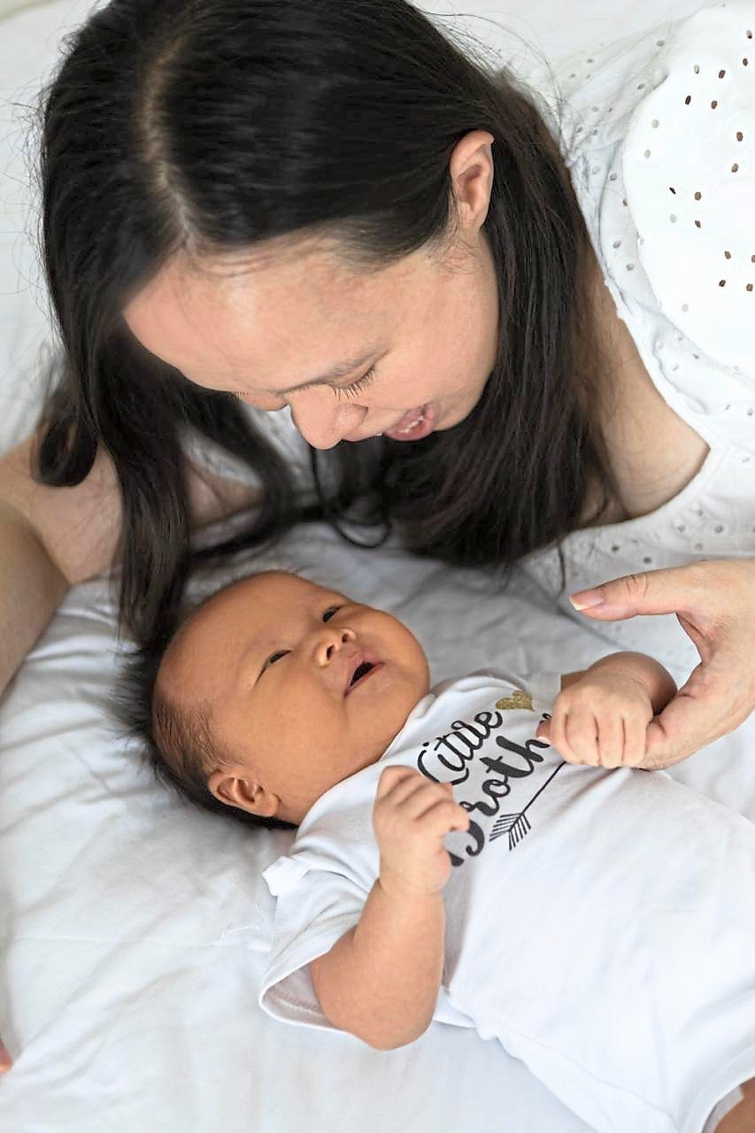 Chen with David at six months of age. She was eager to try a water birth for her second child. — GRACE CHEN