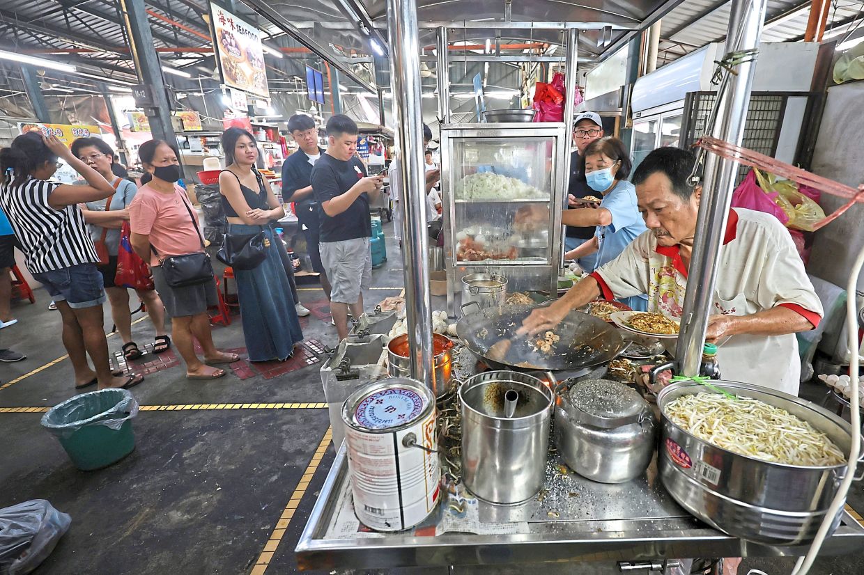 Char kuey teow is among the 13 types of hawker fare listed as the state’s iconic street food that foreigners may soon be barred from cooking. — Filepic
