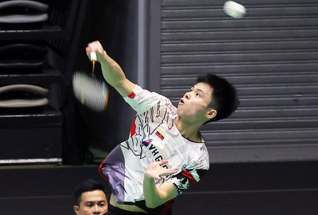 Justin rises above pressure to topple Zhen Yi in final