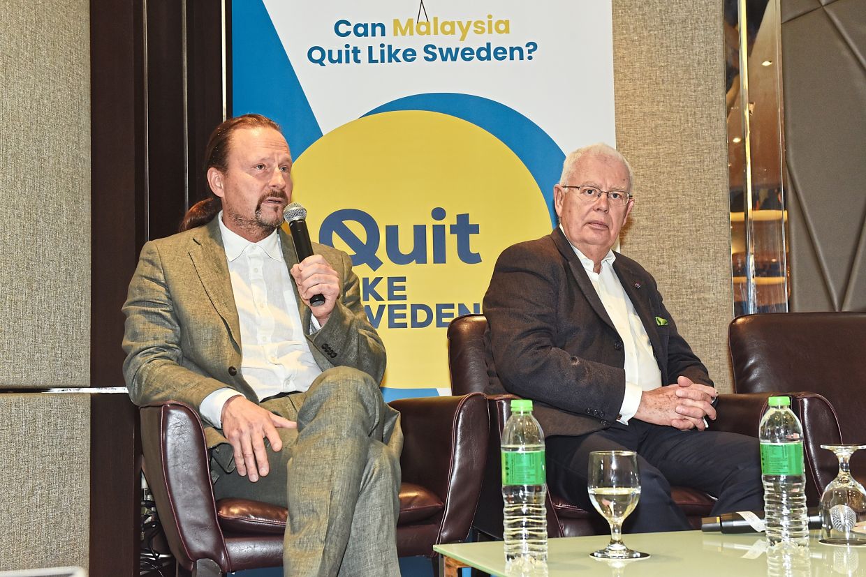 Dr Milton (right) and fellow panellist Prof Fredrik Nyström at the recent ‘Can Malaysia Quit Like Sweden?’ forum.  According to Dr Milton, Sweden has significantly less smoking-related disease and premature deaths. — Quit Like Sweden