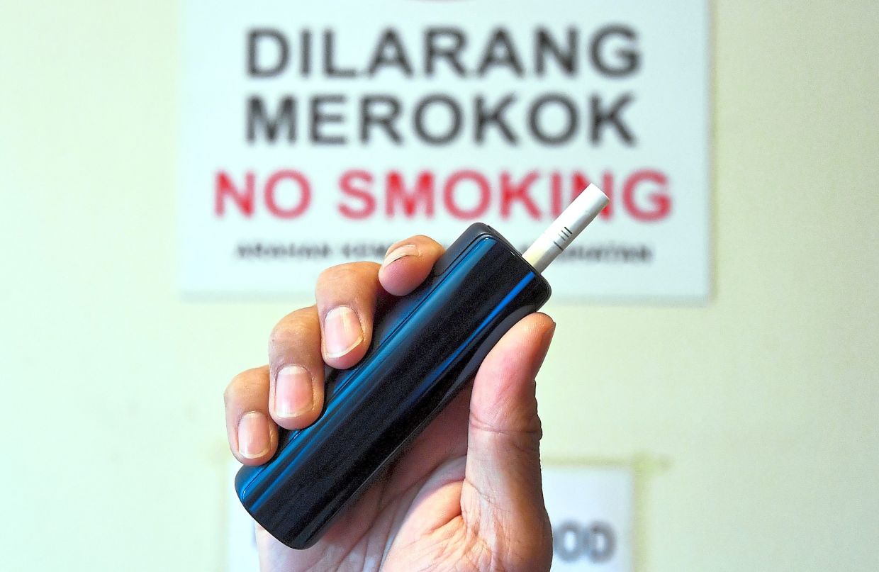 Prof Dr Sharifa Ezat from UKM'S Faculty of Medicine says compered to Sweden, Malaysia has a bigger issue with illegal cigarettes and a surge in vape use. —AZHAR MAHFOF/The Star