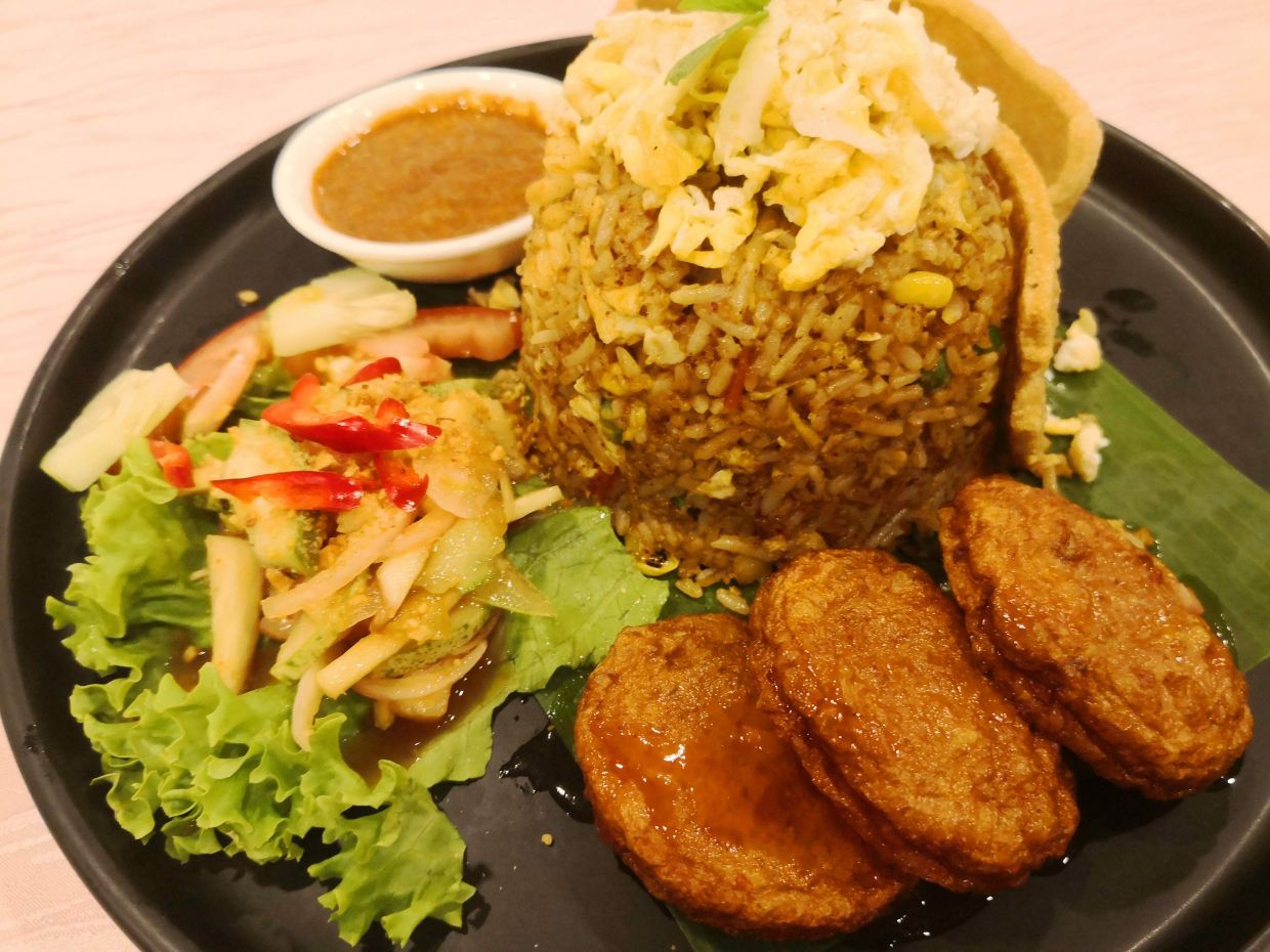 The meticulously prepared nasi goreng tomyam is a feast for both the eyes and the taste buds.