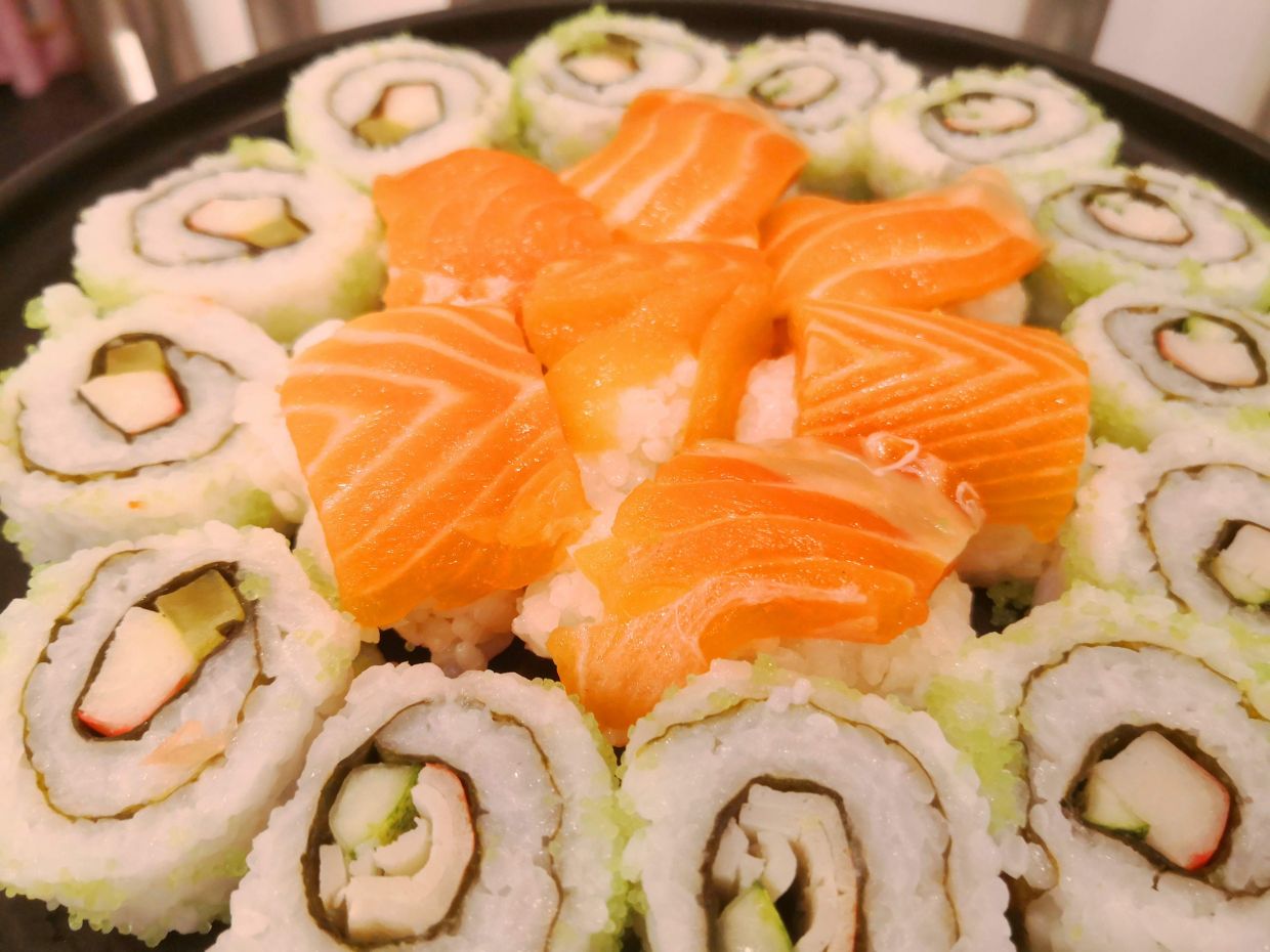 The buffet spread features a good selection of fresh sashimi and sushi.