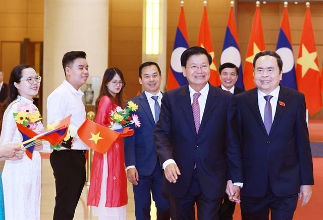 Vietnam-Laos urged to strengthen cooperation to boost economic ...